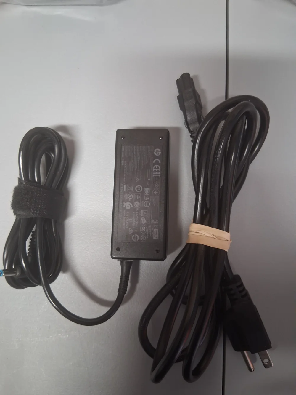 HP 45W 19.5V AC Power Adapter with Blue-Tip Connector, Model No. R-41013323.